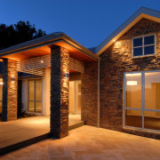 David Reid Homes Waikato designed and built this architecture, elevation, estate, facade, home, house, landscape lighting, lighting, property, real estate, residential area, siding, window, brown