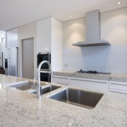 View of light toned kitchen including island with architecture, countertop, interior design, kitchen, real estate, gray