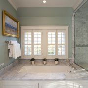 View of contemporary bath area with teal wall bathroom, cabinetry, ceiling, countertop, daylighting, estate, floor, flooring, home, house, interior design, real estate, room, sink, tile, wall, window, wood, gray