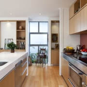 VIew of kitchen with wooden flooring and stainless cabinetry, countertop, cuisine classique, floor, flooring, hardwood, interior design, kitchen, real estate, room, wood, wood flooring, gray