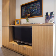 View of wooden TV cabinet. - View of cabinetry, furniture, interior design, gray, orange, brown