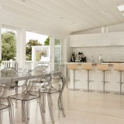 View of contemporary kitchen with light-toned flooring, ceiling dining room, floor, flooring, furniture, interior design, property, real estate, table, gray