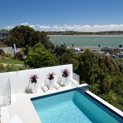 A side view of pool and look out estate, house, leisure, real estate, resort, sea, sky, swimming pool, vacation, water, teal