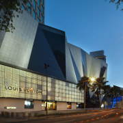 View of exterior. - View of exterior. - architecture, building, city, commercial building, condominium, convention center, corporate headquarters, daytime, evening, facade, headquarters, hotel, landmark, metropolis, metropolitan area, mixed use, night, reflection, sky, skyscraper, structure, tourist attraction, teal