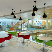 View of seating area with red and green glass, interior design, table, gray