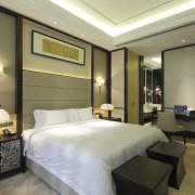 View of bed with white duvet. - View ceiling, hotel, interior design, room, suite, brown