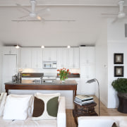 Lounge with white couches, white walls and white ceiling, furniture, home, house, interior design, living room, real estate, room, table, gray, white