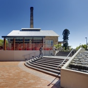 View of outdoor area with water feature. - building, house, property, real estate, roof, sky, teal