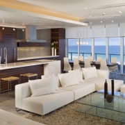 Living area with kitchen in background. - Living furniture, interior design, living room, lobby, penthouse apartment, real estate, gray