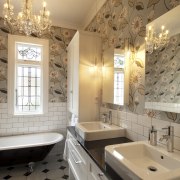 Bathroom with flower patterened wallpaper, black and white bathroom, ceiling, countertop, floor, flooring, home, interior design, room, tile, wall, orange