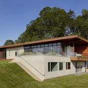 Exterior of house with rusted corten steel. Sustainable architecture, cottage, facade, farmhouse, home, house, property, real estate, roof, villa, brown