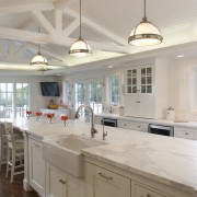 For this kitchen remodel by architect Daniel Strening, cabinetry, ceiling, countertop, cuisine classique, daylighting, home, interior design, kitchen, room, sink, gray, brown