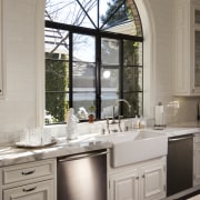 arched window behind farmhouse sink and twin dishwashers, bathroom, cabinetry, countertop, cuisine classique, home, interior design, kitchen, sink, window, gray