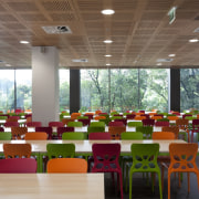 View of study area with colourful chairs. - architecture, cafeteria, classroom, conference hall, function hall, institution, interior design, restaurant, table, brown