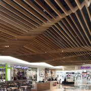 View of ceiling in mall. - View of architecture, ceiling, daylighting, lobby, roof, structure, wood, brown
