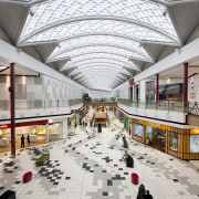 View of light toned interior of mall. - architecture, building, daylighting, shopping mall, gray, white