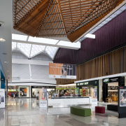 View of light toned interior of mall. - ceiling, interior design, lobby, retail, shopping mall, gray