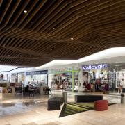 View of light toned interior of mall. - ceiling, food court, interior design, lobby, outlet store, retail, shopping mall, brown