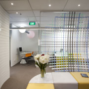 View of waiting area with vase of flowers. ceiling, daylighting, interior design, office, gray