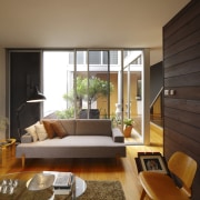 Contemporary lounge with wooden flooring, textured floor matt, architecture, ceiling, daylighting, floor, hardwood, home, house, interior design, living room, real estate, room, window, window covering, wood, wood flooring, brown