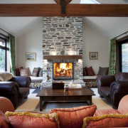 Lounge with exposed ceiling beams, stone chimney and ceiling, fireplace, hearth, home, interior design, living room, real estate, room, red, gray