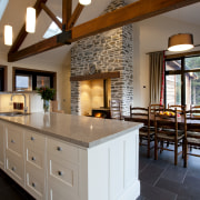 White kitchen island with light toned benchtop, dining countertop, estate, interior design, kitchen, real estate, brown