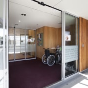 View of entry to school. - View of door, floor, white
