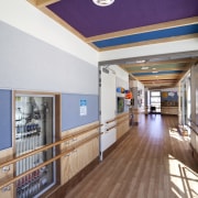 View of walkway with wooden flooring. - View ceiling, daylighting, floor, flooring, hardwood, interior design, lobby, real estate, wood, brown