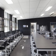 View of classroom with black furniture and walls. conference hall, interior design, office, gray, black, white