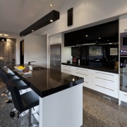 Kitchen with black benchtop and splashback, white cabinetry countertop, cuisine classique, interior design, kitchen, real estate, gray, black