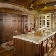 furniture island brick walls white cabinets and shelving cabinetry, ceiling, countertop, cuisine classique, estate, flooring, home, interior design, kitchen, real estate, room, wall, wood stain, brown, orange