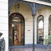 Entrance way with intricate detailling and stainless glass arch, building, door, facade, home, house, iron, porch, real estate, structure, window, white