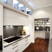 cabinets wuth stainless handles, white against dark wooden cabinetry, ceiling, countertop, cuisine classique, floor, flooring, hardwood, home appliance, interior design, kitchen, laminate flooring, room, wood flooring, gray