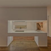 A view of a kitchen designed by Celia fireplace, floor, furniture, hearth, interior design, product design, table, brown