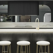 While the rear induction hob keeps a low 