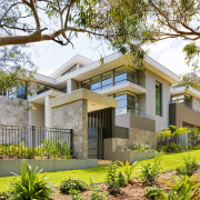 Exterior of house with landscaping. - Exterior of cottage, elevation, estate, facade, home, house, neighbourhood, property, real estate, residential area, tree, brown