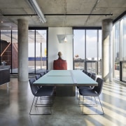 This home was designed by Thomas Meyer of architecture, daylighting, floor, interior design, loft, office, real estate, table, gray