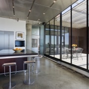 This home was designed by Thomas Meyer of architecture, ceiling, floor, flooring, house, interior design, loft, real estate, table, gray