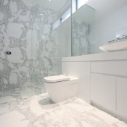 Bathroom with white vanity and toilet and marble bathroom, bidet, ceramic, floor, home, interior design, plumbing fixture, product design, property, room, tap, tile, toilet seat, wall, gray, white