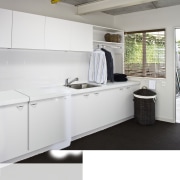 Laundry with white appliances and white cupboards. countertop, floor, interior design, kitchen, product design, room, white