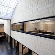 Light toned stone wall in interior. - Light apartment, architecture, ceiling, daylighting, floor, interior design, lobby, wall, gray, white