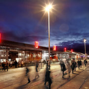 Waterfront area and night with people. - Waterfront boardwalk, city, downtown, dusk, evening, night, sky, street light, blue