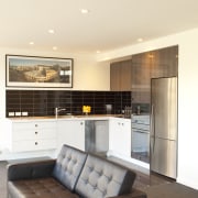 Lounge with grey couch and kitchen with white ceiling, home, house, interior design, living room, real estate, room, white