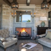 Seen here is a home that's interior was fireplace, hearth, home, interior design, living room, room, wall, gray