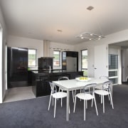 dining table and kitchen, dark cabinets and floors architecture, house, interior design, real estate, white, gray