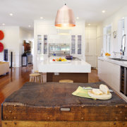 This renovated kitchen by Lynn Malone easily mixes countertop, floor, flooring, home, interior design, kitchen, real estate, room, wood flooring, white