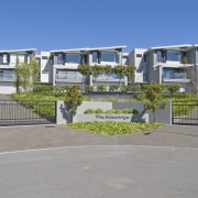 The Moorings in Taupo by Haimes Building townhouses apartment, building, condominium, elevation, estate, facade, home, house, mixed use, neighbourhood, property, real estate, residential area, gray, teal