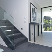 The Moorings in Taupo by Haimes Building. Stairway architecture, door, floor, glass, handrail, house, interior design, property, real estate, stairs, gray