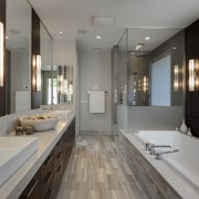 Greys and whites offset wooden floors and ceilings. bathroom, countertop, interior design, room, sink, gray