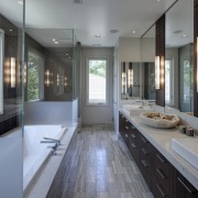 Greys and whites offset wooden floors and ceilings. bathroom, countertop, interior design, kitchen, room, window, gray